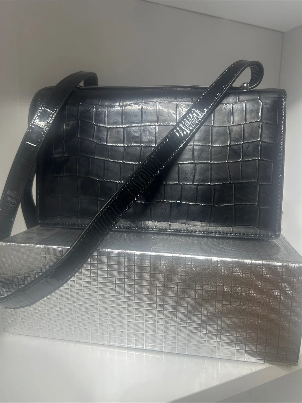 Black Croc-Embossed Crossbody Bag with Metal Script Emblem